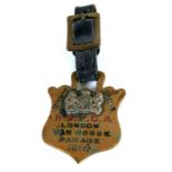 An early 20th century brass and white metal RSPCA London Van Horse Parade Merit badge, 1914, with