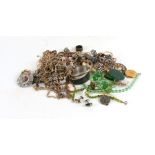 A quantity of costume jewellery to include bangles, necklaces, earrings and other items.