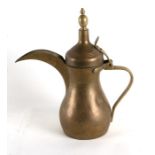 A Turkish / Islamic dallah brass coffee pot1 29cm ( 11.5 ins) high