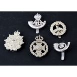 Five silver plated Military cap badges: The Durham Light Infantry, The Rifle Brigade, The Border