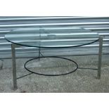 A mid century design chrome and glass coffee table, 90cms (35.5ins) diameter.