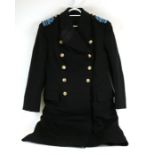 A post 1952 Merchant Navy Lieutenant Commander great coat, having brass buttons with a Queens