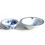 A Lowestoft porcelain bowl with underglaze blue decoration, 10.5cms (4.1ins) diameter; together with