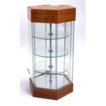 A revolving counter top shop display cabinet, 95cms high, 45cms depth.Condition ReportIn working