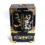 A Chinese black lacquer table jewellery casket with brass and bone inlaid decoration, 20cms (8ins)