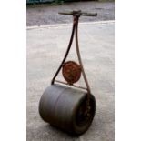 A garden roller with Sherborne maker's plaque.Condition Report Seized.