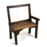 A child's rustic beech chair with solid seat.