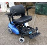 A Care Co. electric wheelchair.Condition Reportlack battery cover