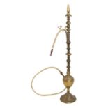 A large Turkish brass hooker pipe, 130ms (51ins) high.