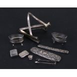 A quantity of scrap silver items to include jar tops, vesta case, spoons and other similar items,