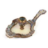 A late 19th century French gilt brass and champleve enamel chamberstick of Rococo form, 22.5 cms (