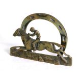 Horseracing interest. A brass letter rack in the form of a horse and jockey, 11cms (4.25ins) high.