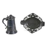 An Art Nouveau Orivit pewter basket, 30cms (12ins) wide; together with a large lidded stein tankard,