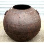 An Indian metal water carrier of riveted construction, approx 50cms (19.5ins) high.