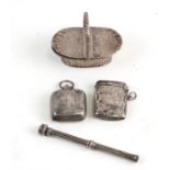 A silver vesta; together with a silver sovereign case; a silver propelling pencil and a white