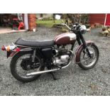 A 1972 triumph Daytona T100R, registration number AWW 118K, engine number T100R XC 14604, maroon and