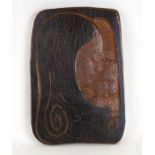A mid 20th century carved wooden panel depicting Madonna and Child, carved with initials 'AB' and