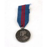 A full size 1911 silver Delhi Durbar Medal with original ribbon