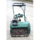 An ATCO Balmoral 20SE self-propelled petrol lawnmower with 21ins cut and grassbox.
