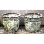A pair of reconstituted stone planters, each 43cms (17ins) diameter (2).