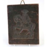 A late 18th / early 19th century wax sugar mould impressed with a gentleman on horseback, 16cms (6.