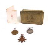 A group of WWI medals and a Princess Mary Christmas tin.Condition ReportNot an original trio and