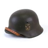 An M1942 Third Reich German helmet with single decal, lining and chin strap. Stamped inside