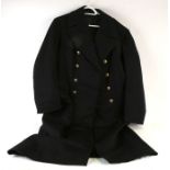 A WW2 Royal Navy Commander great coat by Gieves dated 12/41, having brass buttons with a Kings
