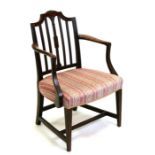 A George III mahogany carver chair.