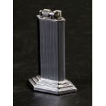 A mid century McMurdo chrome table lighter with three-step hexagon base, patent no. 590958, 10cms (