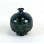A miniature Chinese reticulated vase with green & blue marbleised glaze, 6cms (2.25ins) high.