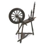 A beech spinning wheel, approx 60cms (24ins) wide.