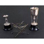 Two silver plated golf related trophies; together with a similar silver plated stand, the largest