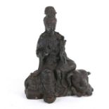 A Chinese bronze Buddhist goddess 'SAMANTABHADRA PU HSIEN' sitting on a six-tusked elephant,