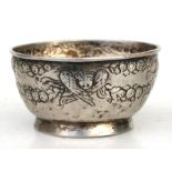 A late 18th / early 19th century silver footed bowl embossed with angels and swag decoration (