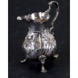 A George III silver cream jug, David Mowden, London 1763, weight 73g, 9cms (3.5ins) high.