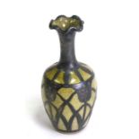 A Japanese crackle ware silver overlaid miniature vase, 9cms (3.5ins) high.