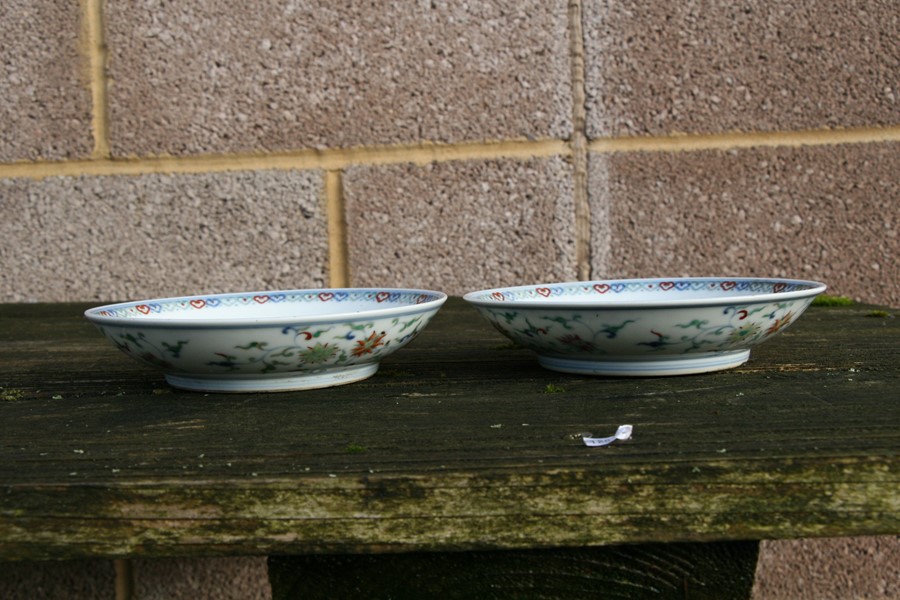 A pair of Chinese shallow dishes decorated with foliate scrolls, blue seal mark to the underside, - Image 11 of 13