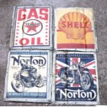A group of four motor related reproduction tin signs.