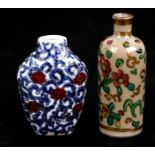 Two Chinese porcelain snuff bottles decorated with foliage, the largest 7.5cms (3ins) high (2).