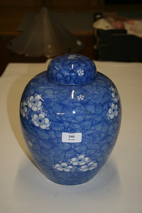 A large Oriental ginger jar decorated with prunus on a cracked ice ground, 28cms (11ins) high. - Image 2 of 7