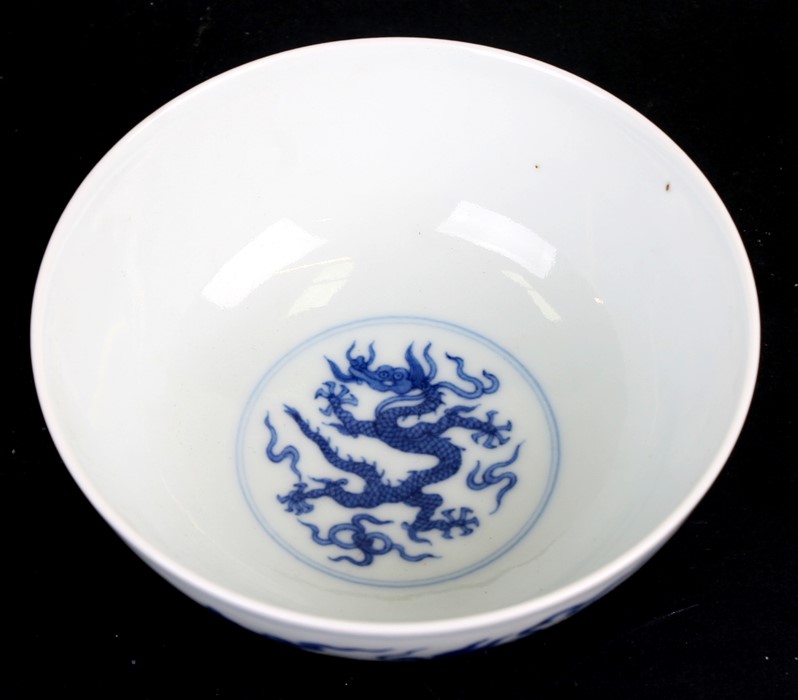 A 19th century Chinese blue & white bowl decorated with dragons amongst clouds, Qianlong seal mark - Image 2 of 11