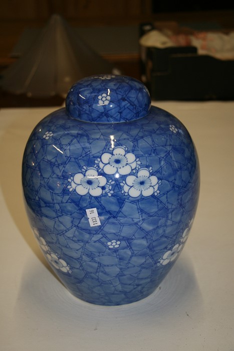 A large Oriental ginger jar decorated with prunus on a cracked ice ground, 28cms (11ins) high. - Image 3 of 7