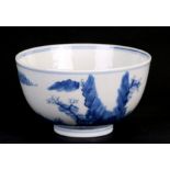 A Chinese blue & white bowl decorated with figures in a landscape, 14cms (5.5ins) diameter.Condition