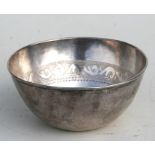 A Persian silver coloured metal bowl, the internal rim decorated with calligraphy, weight 115g,