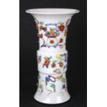 A large 18th / 19th century Chinese Gu vase with applied decoration depicting precious objects,