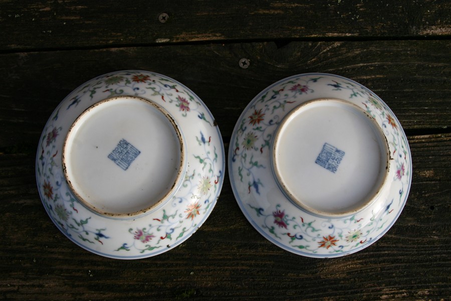 A pair of Chinese shallow dishes decorated with foliate scrolls, blue seal mark to the underside, - Image 12 of 13