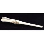 A 19th century Chinese Canton Export carved ivory glove stretcher, 26cms (10ins) long.