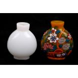 Two Chinese snuff bottles, the largest 5cms (2ins).