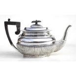 A Victorian silver teapot, Sheffield 1899, weight approx 665g.